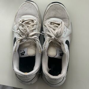 Well worn ladies Nike sneakers
